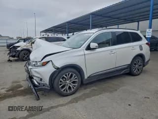 ✅ 2016 Mitsubishi Outlander SE • VIN: JA4AD3A31GZ016243 • Lot: 94599235. Listed on Copart with 130,022 mi. Free auction sales archive from the USA and detailed vehicle history report at DreamBid. Image 1.