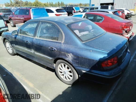 2002 Hyundai Sonata GLS с VIN KMHWF35H12A702457, выставлен на аукционе Copart как лот 60985574 с пробегом 99 698 миль миль и Списание • Salvage title. История ставок и продаж доступна на DreamBid. Изображение 2.