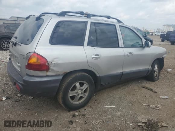 ✅ 2004 Hyundai Santa Fe GLS • VIN: KM8SC13D74U659059 • Lot: 57156945. Listed on Copart with 141,881 mi. Free auction sales archive from the USA and detailed vehicle history report at DreamBid. Image 3.