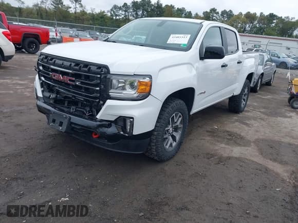 ✅ 2022 GMC Canyon 4WD AT4 • VIN: 1GTG6FEN6N1263017 • Лот: 43403313. Опубликован ранее на IAAI с пробегом 39 750 миль. Бесплатный доступ к архиву аукционных продаж из США и подробный отчёт об истории автомобиля на DreamBid. Изображение 17.