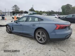 ✅ 2023 Audi e-tron GT Premium Plus • VIN: WAUFJBFW7P7003765 • Лот: 51205295. Опубликован ранее на Copart с пробегом 21 519 миль. Бесплатный доступ к архиву аукционных продаж из США и подробный отчёт об истории автомобиля на DreamBid. Изображение 2.