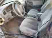 2003 Hyundai Elantra GLS z VIN KMHDN45D53U572664, wystawiony jako Copart lot #82387214 z przebiegiem Nie podano mil oraz Szkoda całkowita • Salvage title. Historia ofert i sprzedaży dostępna na DreamBid. Obrazek 7.