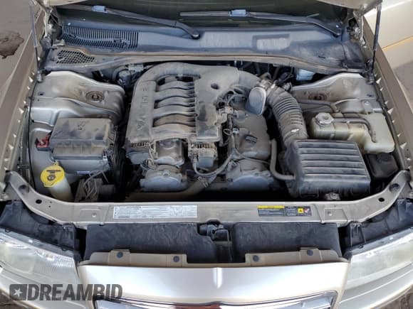 ✅ 2006 Chrysler 300 Touring • VIN: 2C3LA53G06H171307 • Лот: 91315405. Опубликован ранее на Copart с пробегом 86 440 миль. Бесплатный доступ к архиву аукционных продаж из США и подробный отчёт об истории автомобиля на DreamBid. Изображение 11.