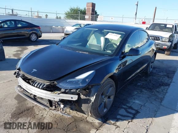 ✅ 2023 Tesla Model 3 • VIN: 5YJ3E1EA8PF514308 • Лот: 43575265. Опубликован ранее на IAAI с пробегом 35 114 миль. Бесплатный доступ к архиву аукционных продаж из США и подробный отчёт об истории автомобиля на DreamBid. Изображение 2.