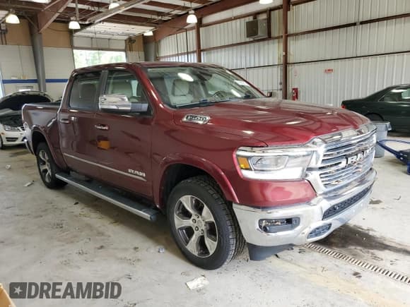 ✅ 2019 Ram 1500 Laramie • VIN: 1C6RRFJG4KN721477 • Lot: 67395315. Listed on Copart with 56,802 mi. Free auction sales archive from the USA and detailed vehicle history report at DreamBid. Image 4.