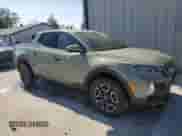 2022 Hyundai Santa Cruz SEL с VIN 5NTJB4AE1NH007406, выставлен на аукционе Copart как лот 75457224 с пробегом 23 725 миль миль и Списание • Salvage title. История ставок и продаж доступна на DreamBid. Изображение 4.