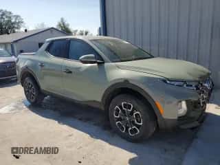 2022 Hyundai Santa Cruz SEL z VIN 5NTJB4AE1NH007406, wystawiony jako Copart lot #75457224 z przebiegiem 23 725 mil mil oraz Szkoda całkowita • Salvage title. Historia ofert i sprzedaży dostępna na DreamBid. Obrazek 4.