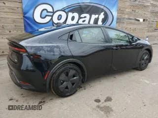 ✅ 2025 Toyota Prius LE • VIN: JTDACAAU0S3054581 • Lot: 93310435. Listed on Copart with 10,715 mi. Free auction sales archive from the USA and detailed vehicle history report at DreamBid. Image 3.