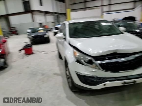 ✅ 2016 Kia Sportage LX • VIN: KNDPB3AC5G7854437 • Лот: 91676275. Опубликован ранее на Copart с пробегом Не указан. Бесплатный доступ к архиву аукционных продаж из США и подробный отчёт об истории автомобиля на DreamBid. Изображение 14.