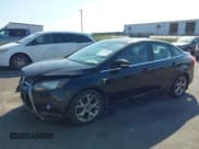 ✅ 2014 Ford Focus Titanium • VIN: 1FADP3J23EL237429 • Lot: 43358765. Listed on IAAI with 138,960 mi. Free auction sales archive from the USA and detailed vehicle history report at DreamBid. Image 17.