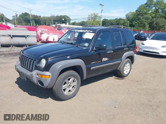 ✅ 2003 Jeep Liberty Sport • VIN: 1J4GL48K13W675080 • Лот: 43192568. Опубликован ранее на IAAI с пробегом 197 659 миль. Бесплатный доступ к архиву аукционных продаж из США и подробный отчёт об истории автомобиля на DreamBid. Изображение 2.