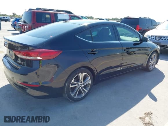 ✅ 2018 Hyundai Elantra SEL • VIN: 5NPD84LF8JH271667 • Lot: 43487626. Listed on IAAI with 115,255 mi. Free auction sales archive from the USA and detailed vehicle history report at DreamBid. Image 4.