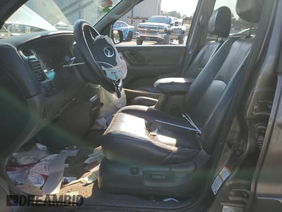 ✅ 2003 Mazda Tribute ES • VIN: 4F2CZ06163KM04237 • Lot: 80303275. Wystawiony na Copart z przebiegiem 164 280 mil. Bezpłatny archiwum sprzedaży aukcyjnych z USA i szczegółowy raport historii pojazdu na DreamBid. Zdjęcie 7.