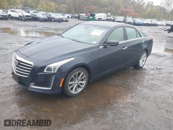 ✅ 2017 Cadillac CTS Luxury AWD • VIN: 1G6AX5SX9H0211378 • Lot: 43416075. Listed on IAAI with 100,580 mi. Free auction sales archive from the USA and detailed vehicle history report at DreamBid. Image 18.