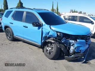 ✅ 2025 Honda Pilot TrailSport • VIN: 5FNYG1H62SB021448 • Lot: 43549576. Listed on IAAI with 10,156 mi. Free auction sales archive from the USA and detailed vehicle history report at DreamBid. Image 1.