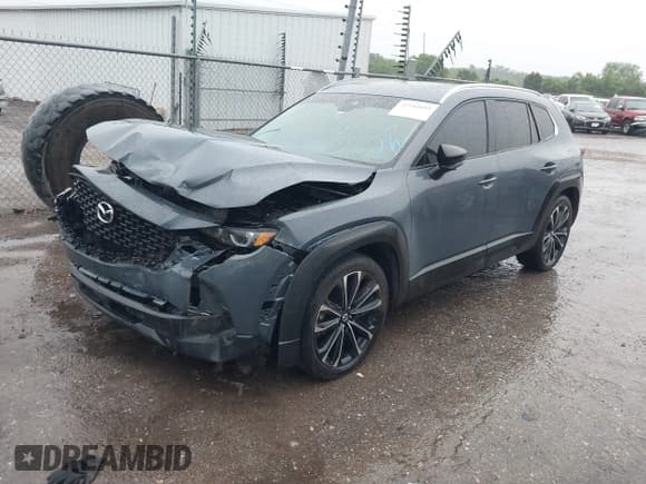 ✅ 2023 Mazda CX-50 S Premium Plus • VIN: 7MMVABEMXPN104518 • Lot: 42184893. Wystawiony na IAAI z przebiegiem 61 991 mil. Bezpłatny archiwum sprzedaży aukcyjnych z USA i szczegółowy raport historii pojazdu na DreamBid. Zdjęcie 2.