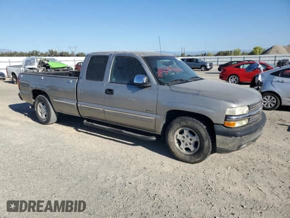 2002 Chevrolet Silverado 1500 with VIN 1GCEC19T92E160531, listed as a Copart auction lot 80475905 with 116,081 mi miles and Salvage title. Bid and sale history available at DreamBid. Image 4.