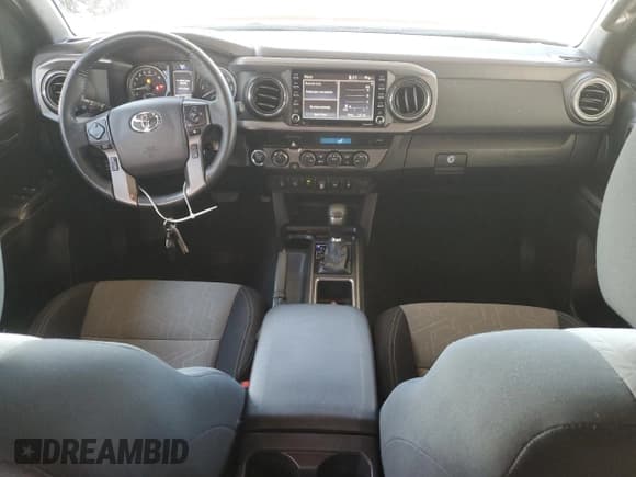 ✅ 2022 Toyota Tacoma SR • VIN: 3TMCZ5AN6NM486697 • Lot: 47771604. Listed on Copart with 49,093 mi. Free auction sales archive from the USA and detailed vehicle history report at DreamBid. Image 8.