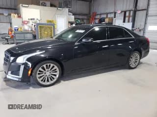 ✅ 2014 Cadillac CTS Premium AWD • VIN: 1G6AZ5S36E0184319 • Lot: 57847875. Listed on Copart with 86,669 mi. Free auction sales archive from the USA and detailed vehicle history report at DreamBid. Image 1.