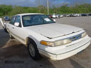 ✅ 1997 Ford Crown Victoria • VIN: 2FALP73W7VX200891 • Lot: 41934703. Listed on IAAI with 174,861 mi. Free auction sales archive from the USA and detailed vehicle history report at DreamBid. Image 1.