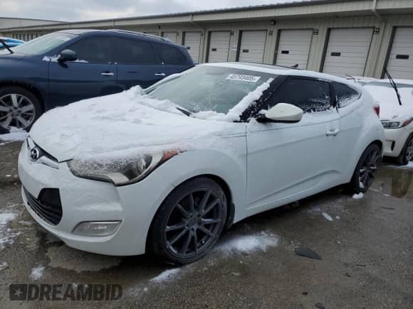 2012 Hyundai Veloster w/Red Int z VIN KMHTC6AD5CU030340, wystawiony jako Copart lot #45793405 z przebiegiem 139 667 mil mil oraz Czysty tytuł • Clean title. Historia ofert i sprzedaży dostępna na DreamBid. Obrazek 1.