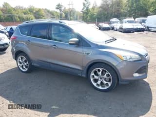 ✅ 2013 Ford Escape Titanium • VIN: 1FMCU9J99DUB51397 • Lot: 43286662. Listed on IAAI with 133,274 mi. Free auction sales archive from the USA and detailed vehicle history report at DreamBid. Image 1.