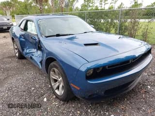 ✅ 2021 Dodge Challenger SXT • VIN: 2C3CDZAG2MH520899 • Lot: 43249657. Wystawiony na IAAI z przebiegiem 64 330 mil. Bezpłatny archiwum sprzedaży aukcyjnych z USA i szczegółowy raport historii pojazdu na DreamBid. Zdjęcie 1.