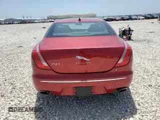 ✅ 2015 Jaguar XJ Portfolio • VIN: SAJWJ2GD5F8V76853 • Lot: 60734884. Wystawiony na Copart z przebiegiem 111 662 mil. Bezpłatny archiwum sprzedaży aukcyjnych z USA i szczegółowy raport historii pojazdu na DreamBid. Zdjęcie 6.