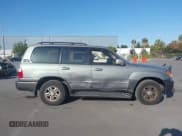 ✅ 2001 Lexus LX 470 • VIN: JTJHT00W113500583 • Lot: 42373922. Wystawiony na IAAI z przebiegiem 269 323 mil. Bezpłatny archiwum sprzedaży aukcyjnych z USA i szczegółowy raport historii pojazdu na DreamBid. Zdjęcie 13.