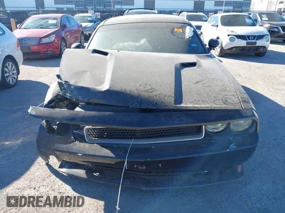 2012 Dodge Challenger SXT Plus with VIN 2C3CDYAG6CH176860, listed as a IAAI auction lot 43584841 with Not provided miles and . Bid and sale history available at DreamBid. Image 12.
