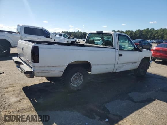✅ 1995 GMC Sierra 1500 • VIN: 1GTEC14H0SZ552129 • Лот: 92077455. Опубликован ранее на Copart с пробегом 129 670 миль. Бесплатный доступ к архиву аукционных продаж из США и подробный отчёт об истории автомобиля на DreamBid. Изображение 3.