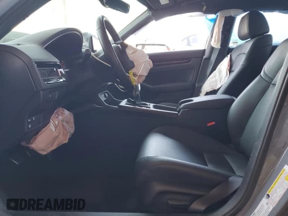 ✅ 2024 Honda Civic Sport Touring • VIN: 19XFL1G82RE030821 • Lot: 61604055. Wystawiony na Copart z przebiegiem 4 977 mil. Bezpłatny archiwum sprzedaży aukcyjnych z USA i szczegółowy raport historii pojazdu na DreamBid. Zdjęcie 7.