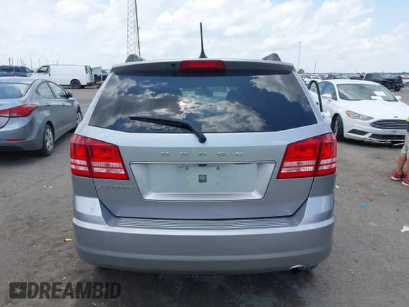 2018 Dodge Journey SE с VIN 3C4PDCAB9JT444843, выставлен на аукционе IAAI как лот 42473807 с пробегом 146 996 миль миль и . История ставок и продаж доступна на DreamBid. Изображение 17.