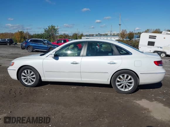 2007 Hyundai Azera SE with VIN KMHFC46F07A229069, listed as a IAAI auction lot 43510048 with 90,072 mi miles and . Bid and sale history available at DreamBid. Image 14.