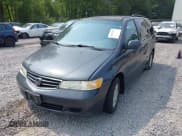 ✅ 2004 Honda Odyssey EX-L • VIN: 5FNRL18954B131780 • Lot: 42927575. Listed on IAAI with 169,965 mi. Free auction sales archive from the USA and detailed vehicle history report at DreamBid. Image 6.