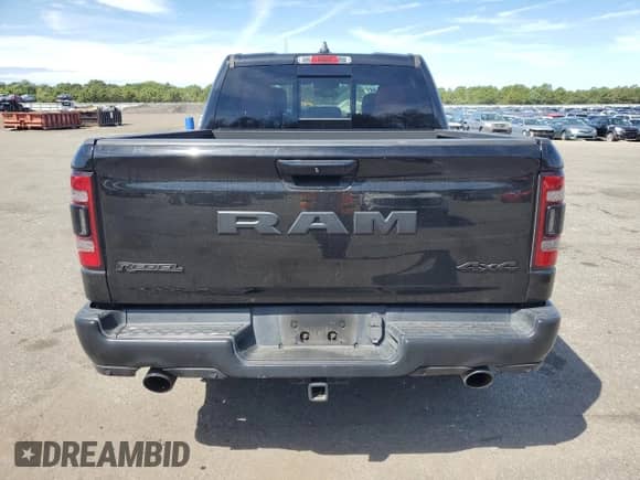 2019 Ram 1500 Rebel z VIN 1C6SRFLT0KN698856, wystawiony jako Copart lot #69225485 z przebiegiem 143 146 mil mil oraz Szkoda całkowita • Salvage title. Historia ofert i sprzedaży dostępna na DreamBid. Obrazek 6.