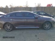 ✅ 2015 Hyundai Sonata Sport • VIN: 5NPE34AB6FH084163 • Lot: 43640225. Listed on IAAI with 234,665 mi. Free auction sales archive from the USA and detailed vehicle history report at DreamBid. Image 13.