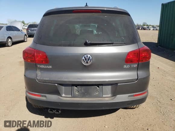 2013 Volkswagen Tiguan SE z VIN WVGAV7AX7DW018388, wystawiony jako Copart lot #56188045 z przebiegiem 98 066 mil mil oraz Szkoda całkowita • Salvage title. Historia ofert i sprzedaży dostępna na DreamBid. Obrazek 6.