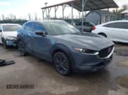 ✅ 2022 Mazda CX-30 S Carbon Edition • VIN: 3MVDMBCL0NM458115 • Lot: 41223224. Listed on IAAI with 67,066 mi. Free auction sales archive from the USA and detailed vehicle history report at DreamBid. Image 1.