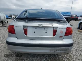 ✅ 2003 Hyundai Elantra GT • VIN: KMHDN55D93U097011 • Lot: 55799945. Wystawiony na Copart z przebiegiem 129 631 mil. Bezpłatny archiwum sprzedaży aukcyjnych z USA i szczegółowy raport historii pojazdu na DreamBid. Zdjęcie 6.