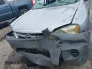 ✅ 2005 Mazda Tribute i • VIN: 4F2YZ02Z15KM53382 • Lot: 42888804. Listed on IAAI with 207,601 mi. Free auction sales archive from the USA and detailed vehicle history report at DreamBid. Image 12.