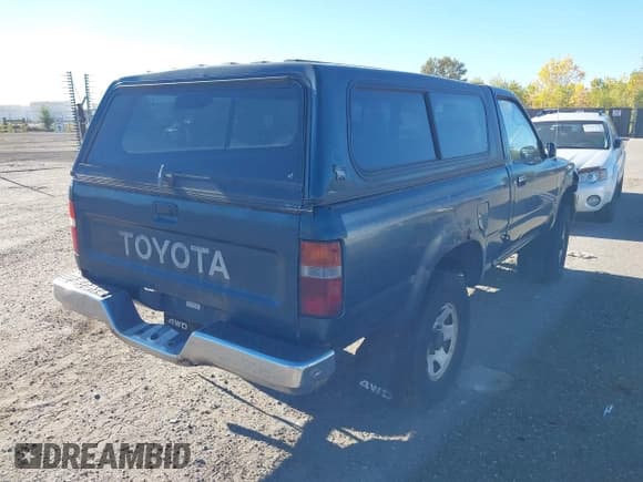 ✅ 1994 Toyota Pickup DX • VIN: JT4RN01P6R7067209 • Lot: 43502725. Listed on IAAI with 242,618 mi. Free auction sales archive from the USA and detailed vehicle history report at DreamBid. Image 4.
