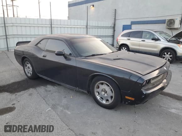 ✅ 2010 Dodge Challenger SE • VIN: 2B3CJ4DVXAH212457 • Lot: 87268434. Wystawiony na Copart z przebiegiem Nie podano. Bezpłatny archiwum sprzedaży aukcyjnych z USA i szczegółowy raport historii pojazdu na DreamBid. Zdjęcie 4.