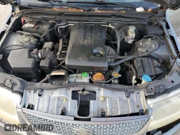 ✅ 2010 Suzuki Grand Vitara Premium • VIN: JS3TE0D21A4101120 • Лот: 71016604. Опубликован ранее на Copart с пробегом 99 917 миль. Бесплатный доступ к архиву аукционных продаж из США и подробный отчёт об истории автомобиля на DreamBid. Изображение 13.