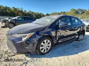 ✅ 2023 Toyota Corolla Hybrid LE • VIN: JTDBCMFE4PJ002459 • Лот: 86511125. Опубликован ранее на Copart с пробегом 58 203 миль. Бесплатный доступ к архиву аукционных продаж из США и подробный отчёт об истории автомобиля на DreamBid. Изображение 1.