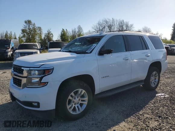 ✅ 2020 Chevrolet Tahoe LT • VIN: 1GNSKBKC5LR243378 • Lot: 52690775. Listed on Copart with 79,900 mi. Free auction sales archive from the USA and detailed vehicle history report at DreamBid. Image 1.