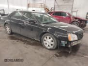 ✅ 2003 Cadillac DeVille DTS • VIN: 1G6KF57953U134219 • Lot: 41615872. Wystawiony na IAAI z przebiegiem 147 901 mil. Bezpłatny archiwum sprzedaży aukcyjnych z USA i szczegółowy raport historii pojazdu na DreamBid. Zdjęcie 1.