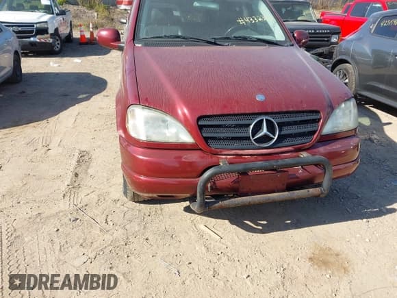 ✅ 2000 Mercedes-Benz M 320/430/500 • VIN: 4JGAB54E4YA156089 • Lot: 43323616. Listed on IAAI with 197,781 mi. Free auction sales archive from the USA and detailed vehicle history report at DreamBid. Image 6.