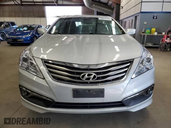 2016 Hyundai Azera z VIN KMHFG4JG1GA506784, wystawiony jako Copart lot #84911744 z przebiegiem 88 057 mil mil oraz Szkoda całkowita • Salvage title. Historia ofert i sprzedaży dostępna na DreamBid. Obrazek 5.