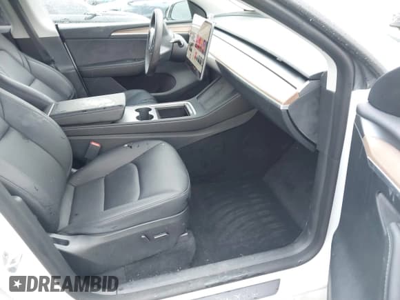 ✅ 2023 Tesla Model Y Long Range • VIN: 7SAYGDEE5PF753922 • Lot: 41529511. Listed on IAAI with 50,731 mi. Free auction sales archive from the USA and detailed vehicle history report at DreamBid. Image 5.